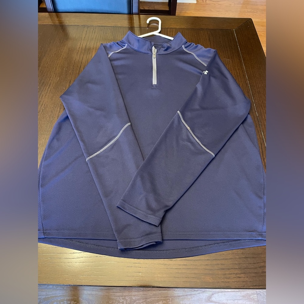 Pair of UA 1/4-zip lightweight pullovers